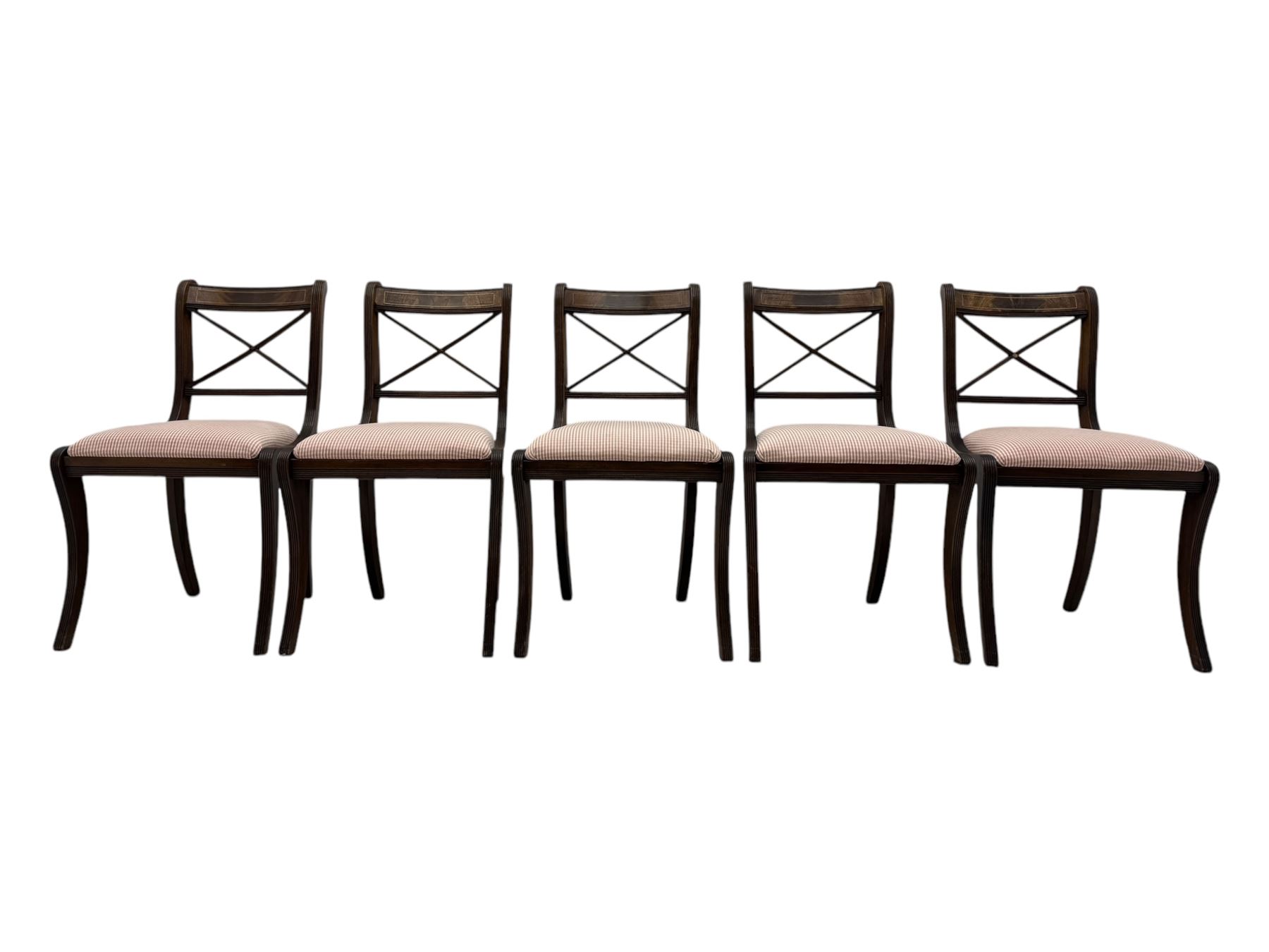 Set of ten (8+2) Regency design mahogany and brass inlaid dining chairs, bar cresting rail over x-framed back, upholstered drop-in seats, moulded frame and sabre supports 