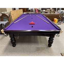 Riley - full-sized 12' x 6' slate bed snooker table, mahogany frame with purple baize, raised on turned and fluted baluster supports, recently refurbished; together with, cues, scoreboard, cover, snooker and pool balls