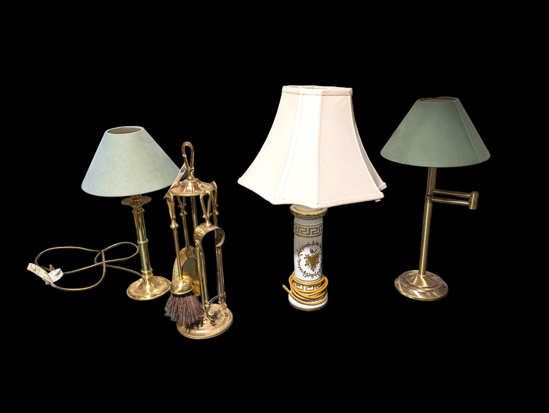 Adjustable brass lamp, Porcelain de France lamp and one other brass lamp, together with a brass fireside compendium 