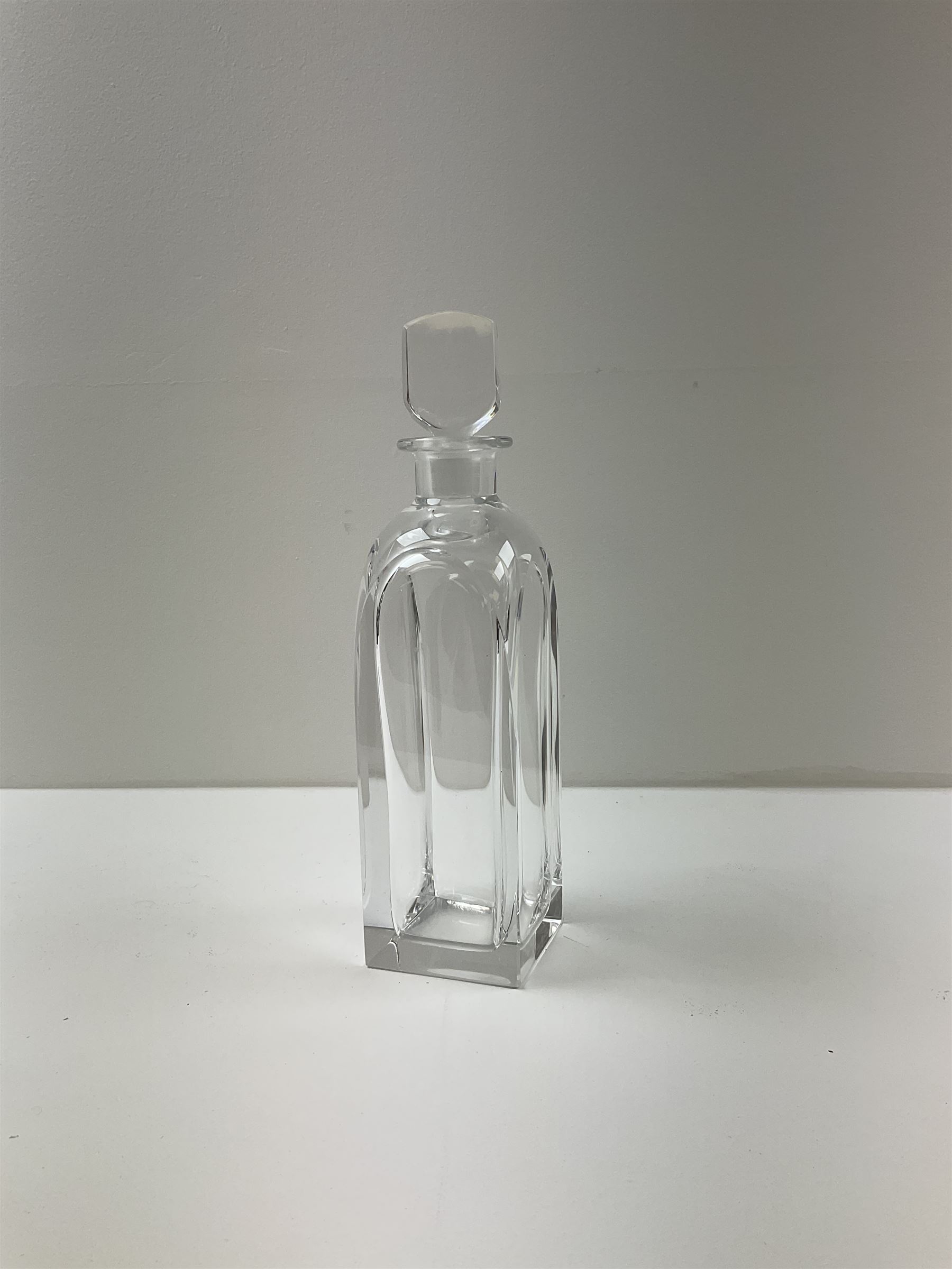 Orrefors glass decanter, singed to base, together with two Waterford cut crystal decanters, tallest H34cm