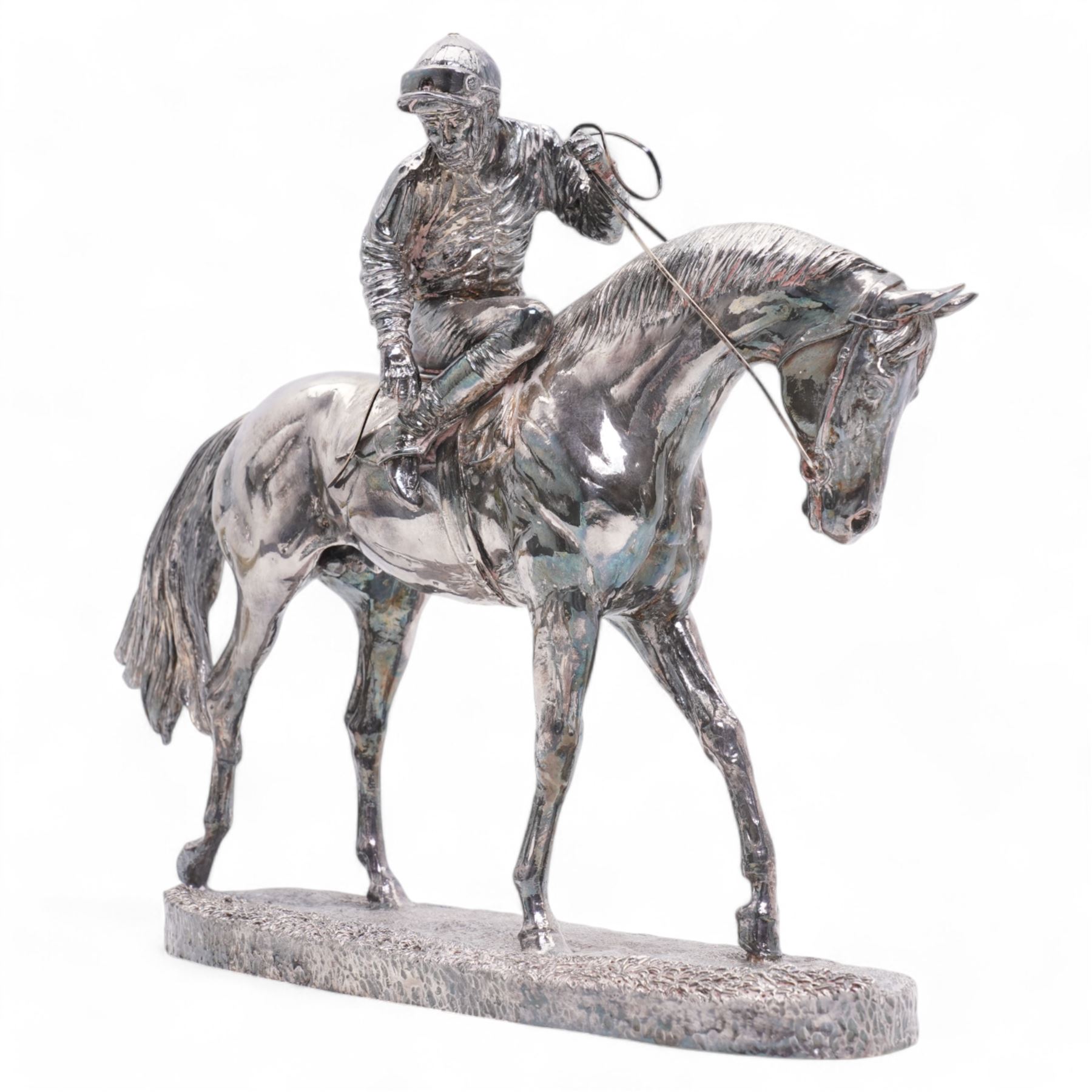 Elizabeth II silver racehorse and jockey, modelled by David Geenty, by Camelot Silverware, Sheffield 1995 (filled), on oval base modelled as turf, L34cm x H27cm