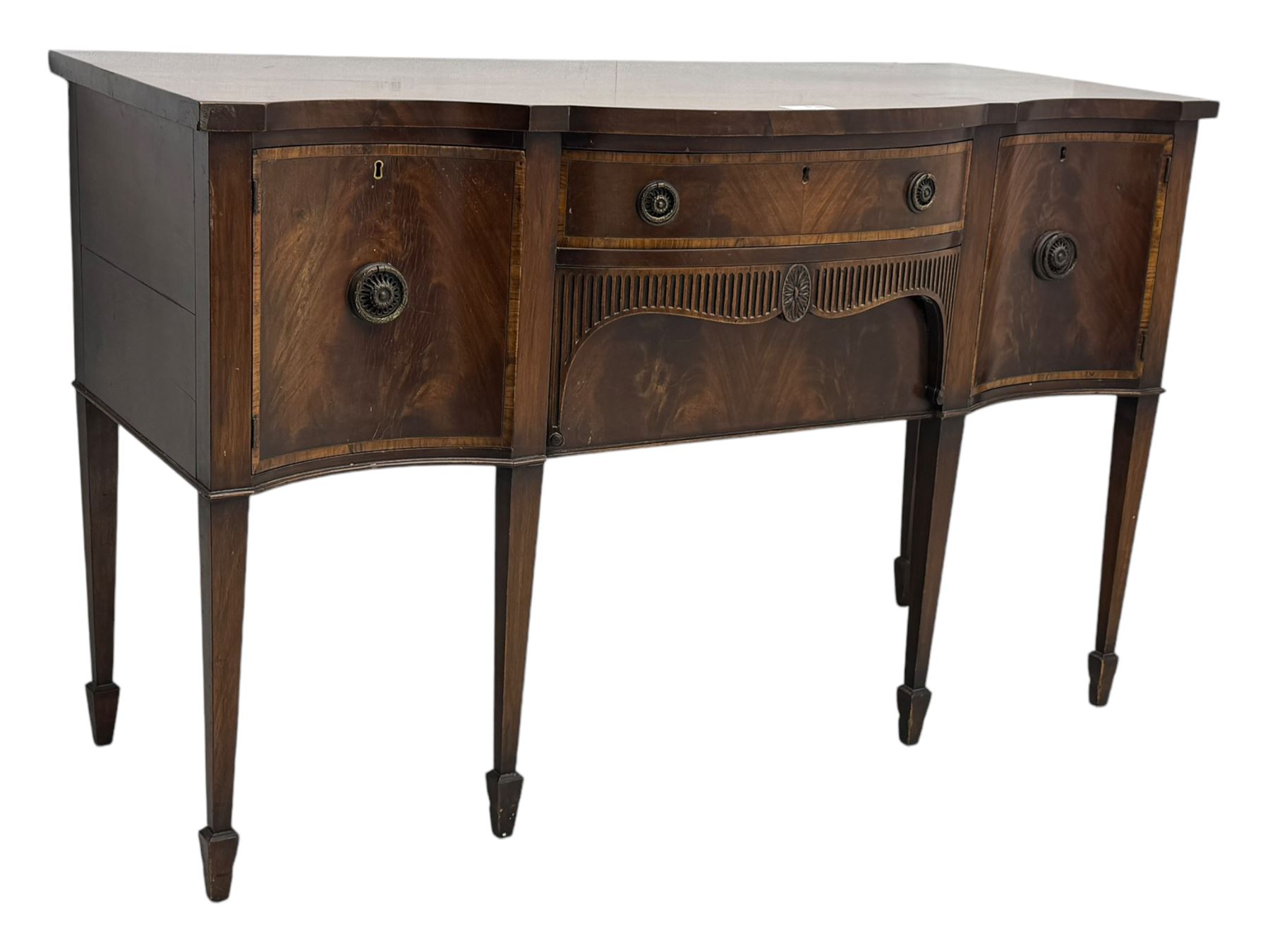 Early 19th century serpentine sideboard, fitted with two cupboards and two drawers, on square tapering supports with spade feet