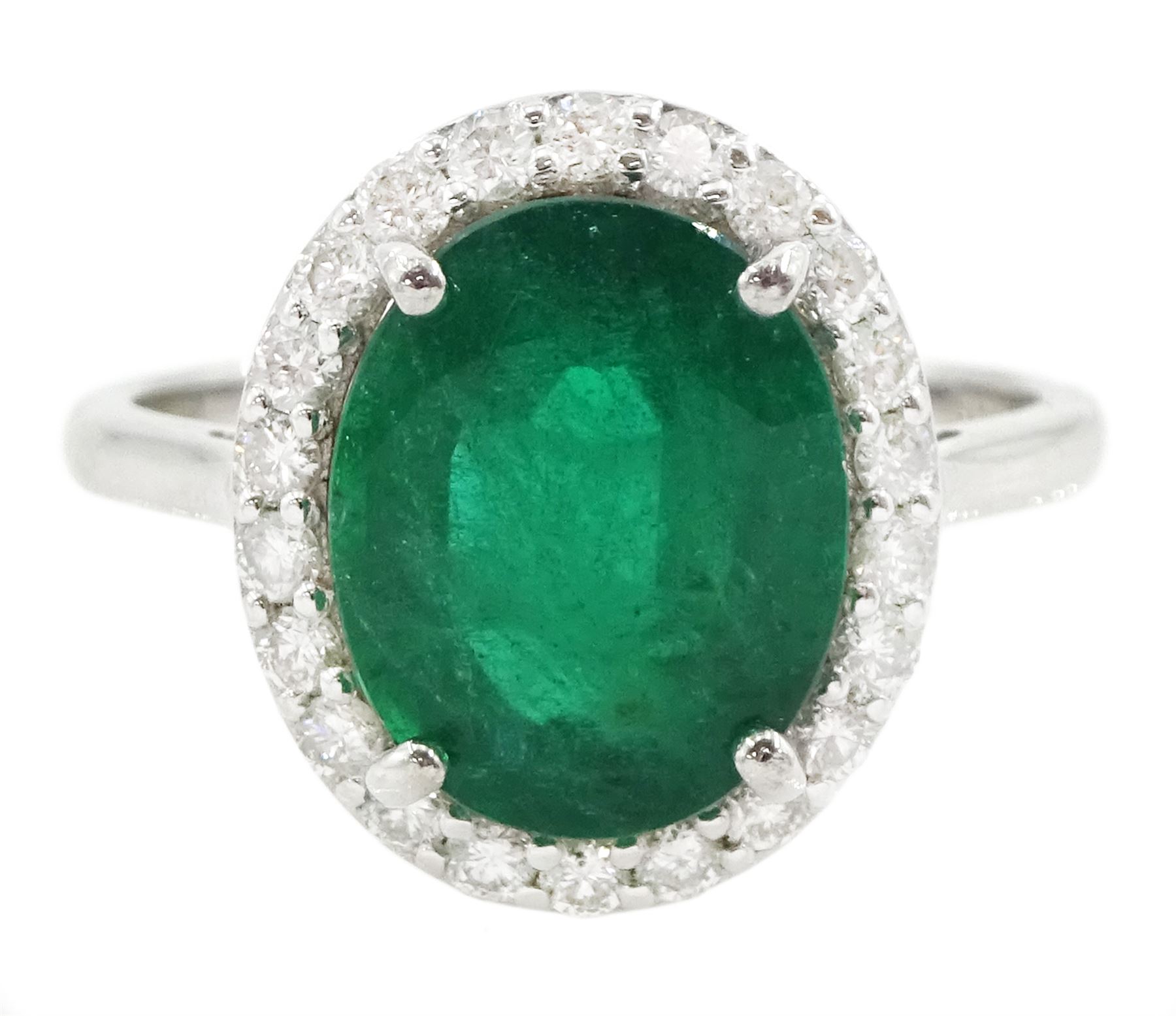 18ct white gold oval cut emerald and round brilliant cut diamond cluster ring, hallmarked, total emerald weight 3.33 carat, total diamond weight 0.40 carat, with World Gemological Institute Report