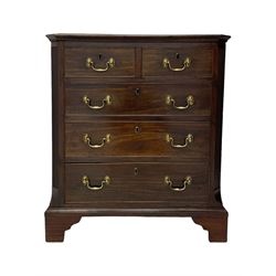 Small George III mahogany chest, rectangular canted form, moulded top over two short and three long cock-beaded drawers, fitted with brass swan neck handles and oval plates, enclosed by fluted upright corners, on bracket feet 