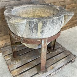 Large 19th century circular stone mortar planter on wrought iron stand