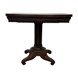 Victorian mahogany tea table, rectangular fold-over and swivel action top with rounded corners, ogee moulded frieze with applied bead, octagonal column mounted by cluster column uprights, on step moulded octagonal foot with applied beading, splayed and scrolled feet with recessed castors 