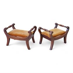 Pair of early to mid-19th century footstools, scroll uprights terminating to splayed feet, united by turned stretchers, drop-in seats upholstered in mustard fabric 