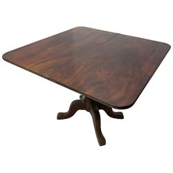 19th century mahogany table, fold-over rectangular with rounded corners, on turned vasiform column, on quadruple out splayed supports