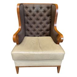 Walnut finish framed wing back armchair upholstered leather and buttoned fabric