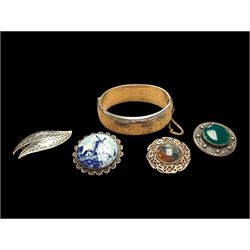 Silver bangle with four silver brooches