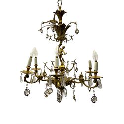 Gilt metal six branch ceiling light, the central stem modelled as a ballerina, decorated with glass pendants 