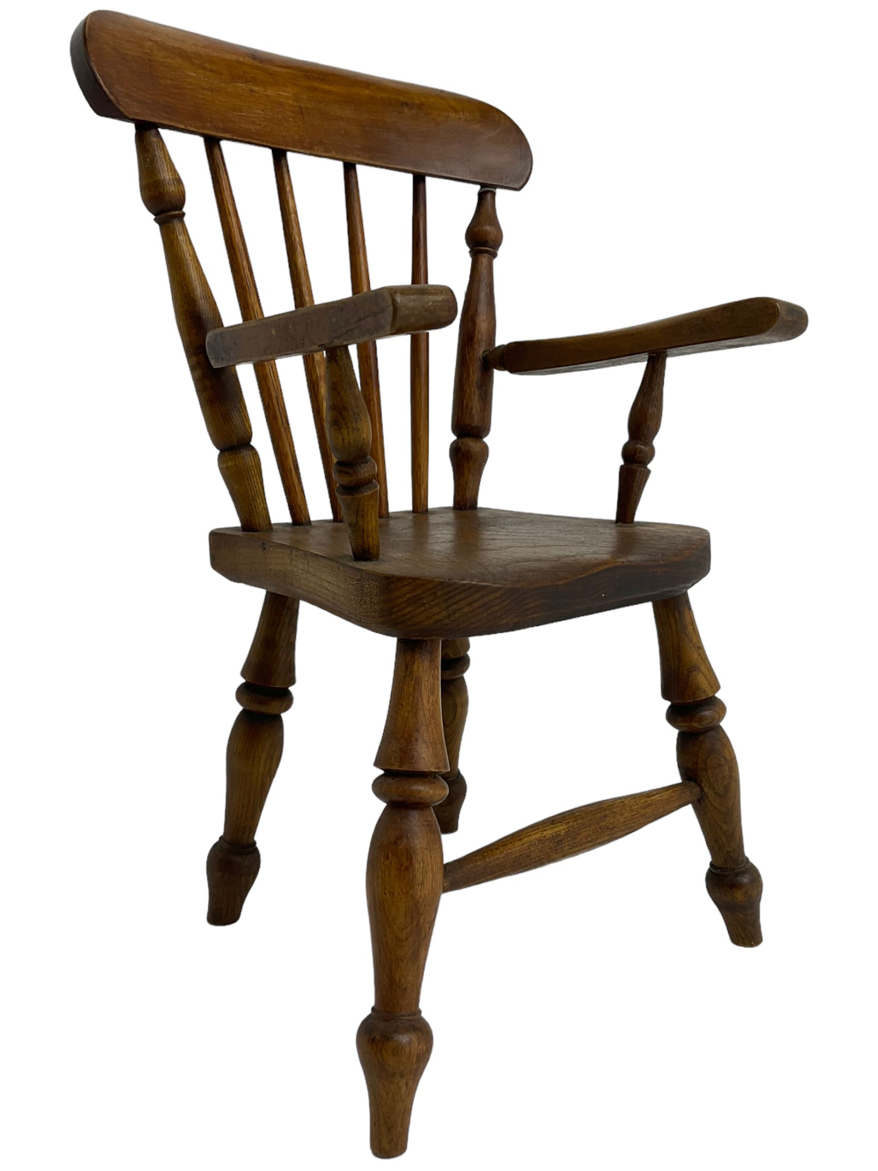 19th century elm and beech child's farmhouse chair, shaped cresting rail over stick back, on turned supports 