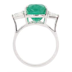 18ct white gold three stone oval cut emerald and trillion cut diamond ring, stamped, emerald approx 5.65 carat, total diamond weight approx 0.65 carat