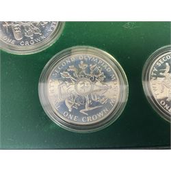 Queen Elizabeth II Isle of Man 1980 'Commemorating the 1980 Olympics' silver proof crown four coin set and 1979 '1000th Anniversary of Tynwald' silver proof crown five coin set, both sets cased with certificates 