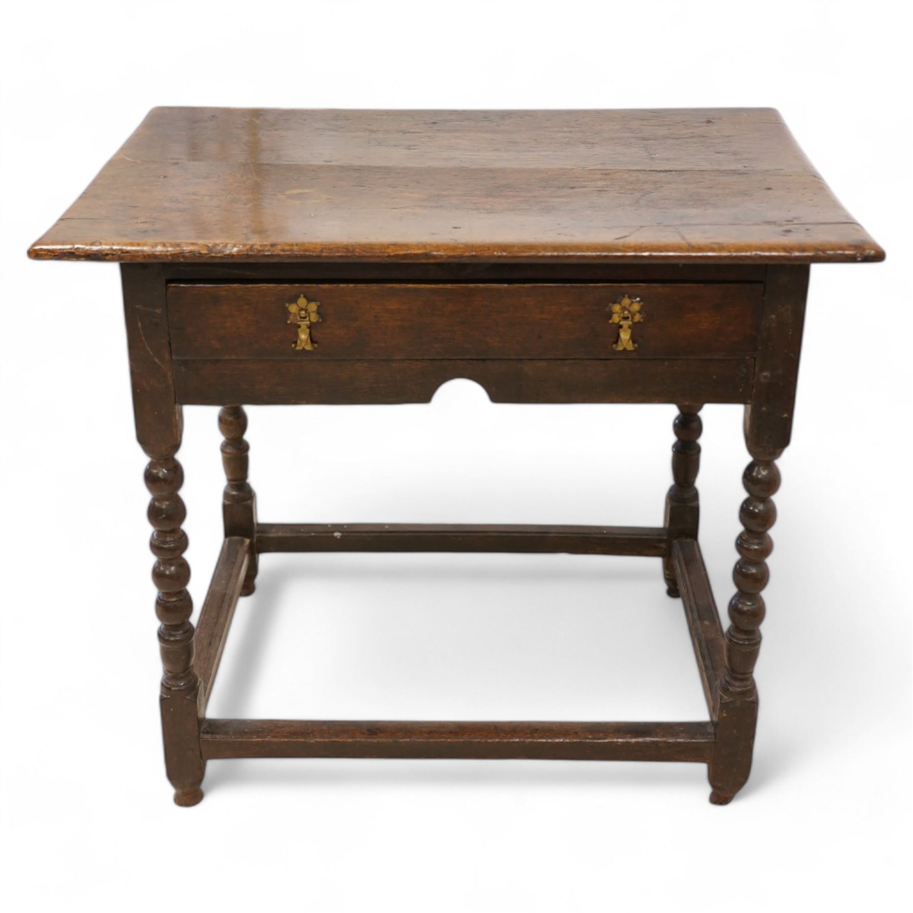 17th century oak side table, two plank rectangular top over single drawer, on bobbin-turned supports united by stretchers 