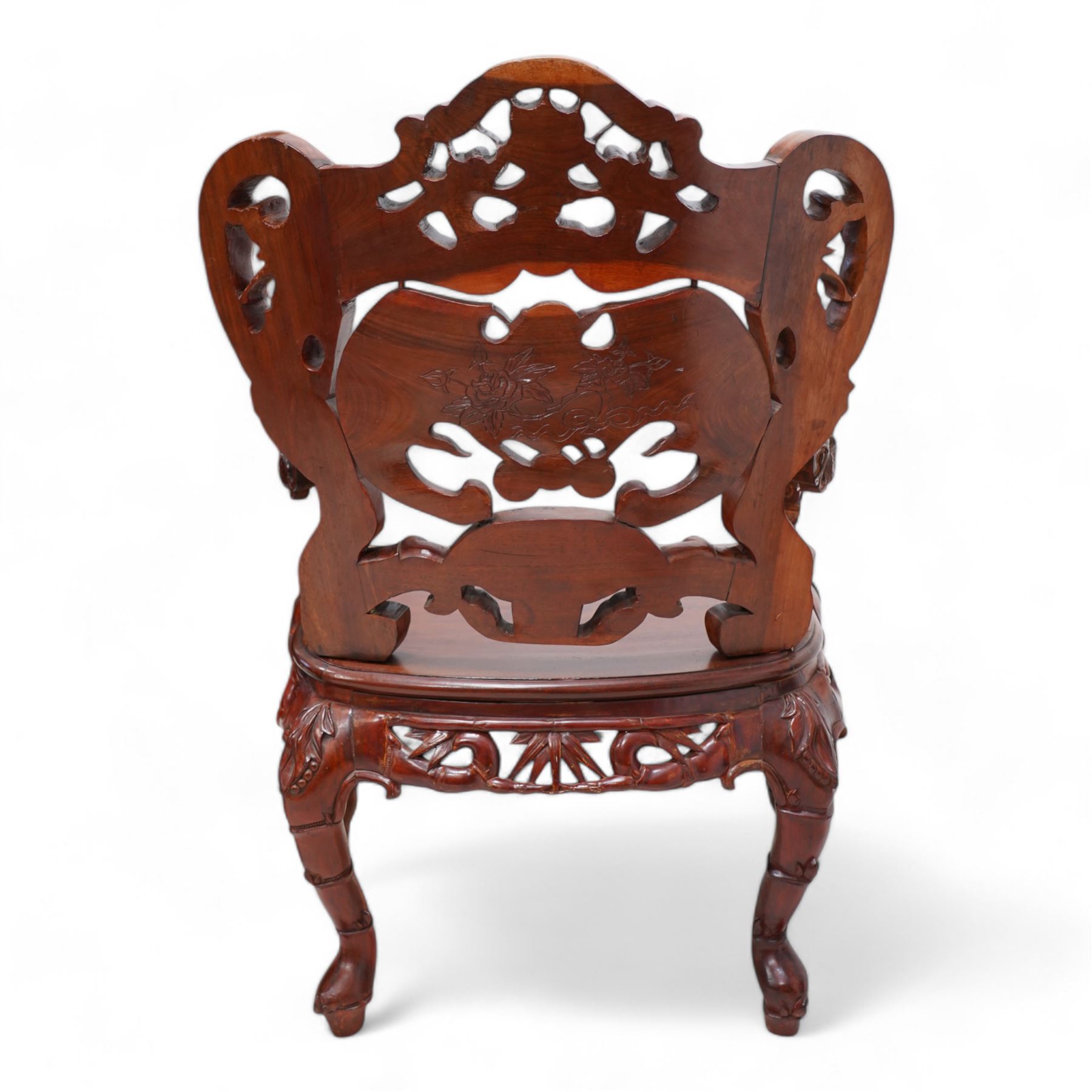 Pair of Japanese carved hardwood throne chairs, pierced and dragon carved cresting over pierced back panel carved with bat, extending dragon carved arms over panelled seat, the seat rails pierced and carved with trailing branches and foliate motifs, on cabriole supports 