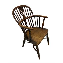 19th century yew wood and elm Windsor chair, low hoop stick back with pierced splat, dished seat raised on ring turned supports joined by crinoline stretcher