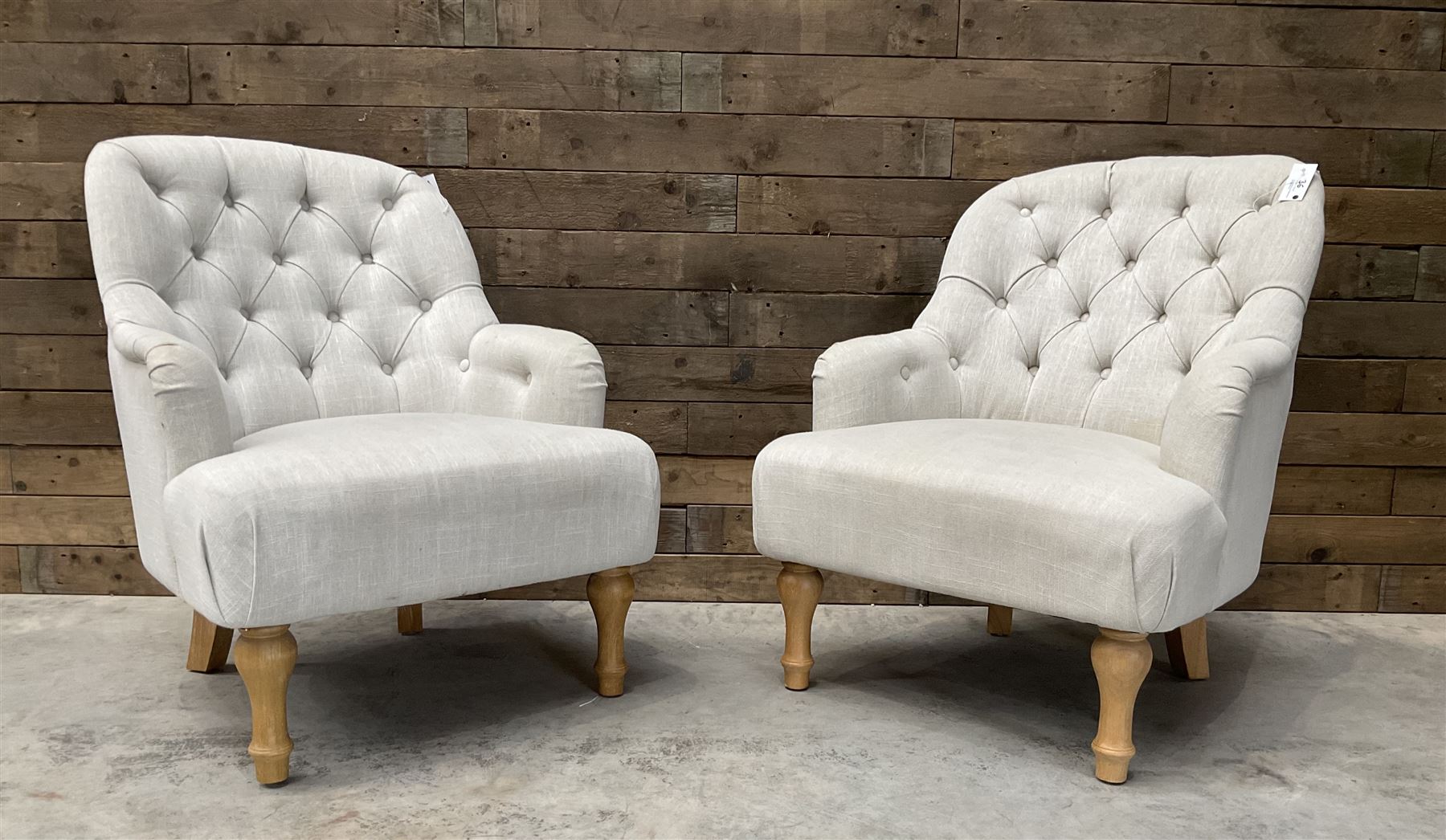 Pair of armchairs upholstered in button back linen fabric