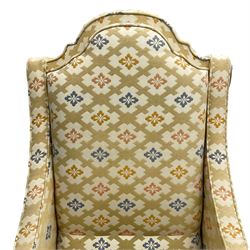 Spanish high back throne armchair, arched cresting rail over scooped arms, upholstered in gold and ivory patterned fabric, on a pitch pine base with spade feet