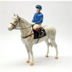 A limited edition John Beswick jockey on horseback, marked beneath, no 097/250, H28.5cm. 