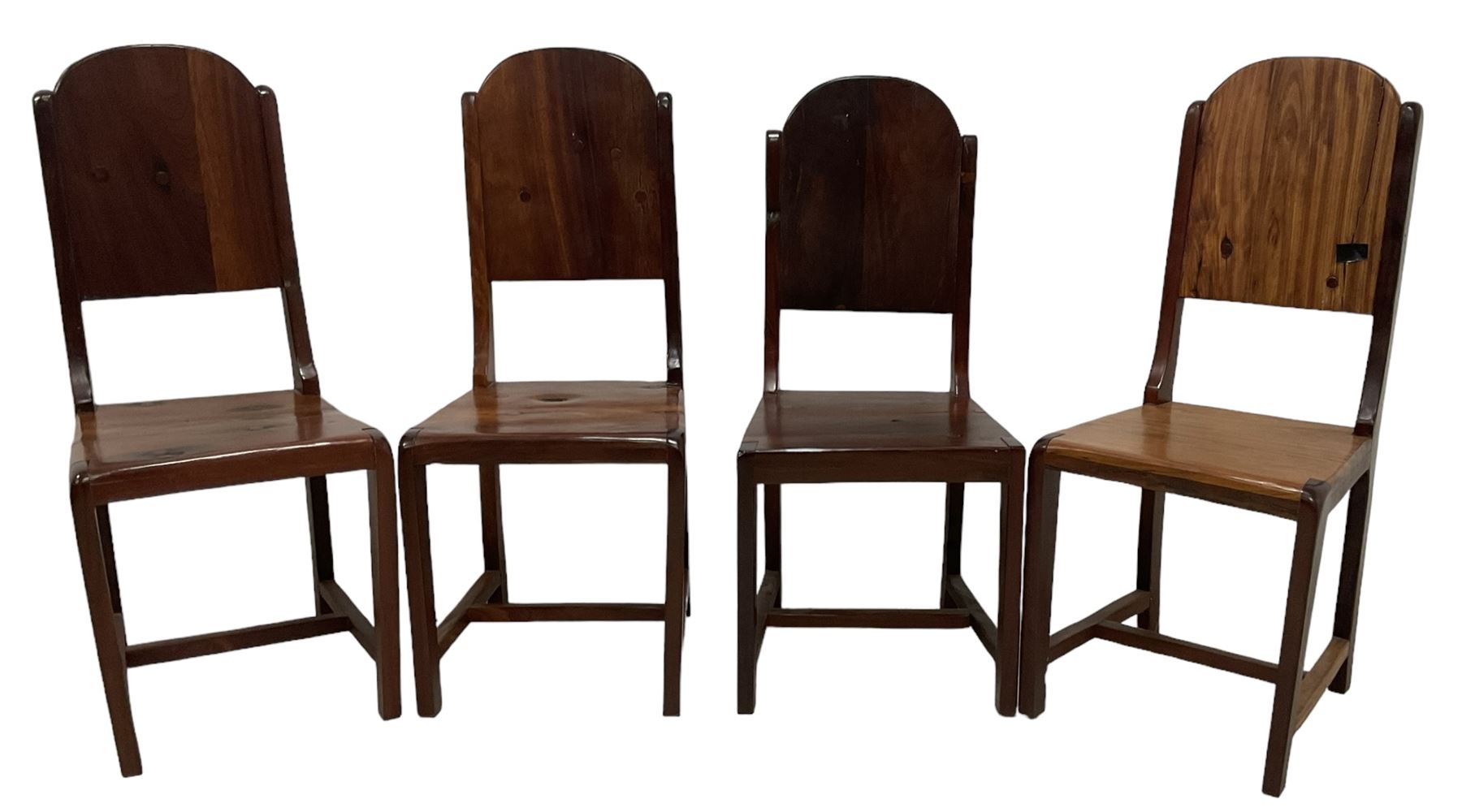 Mid-to-late 20th century teak dining table, rectangular top with canted corners, on square tapering supports with spade feet (214cm x 119cm, H76cm); and a set of eight Burmese reclaimed teak dining chairs, high arched back over panelled seat