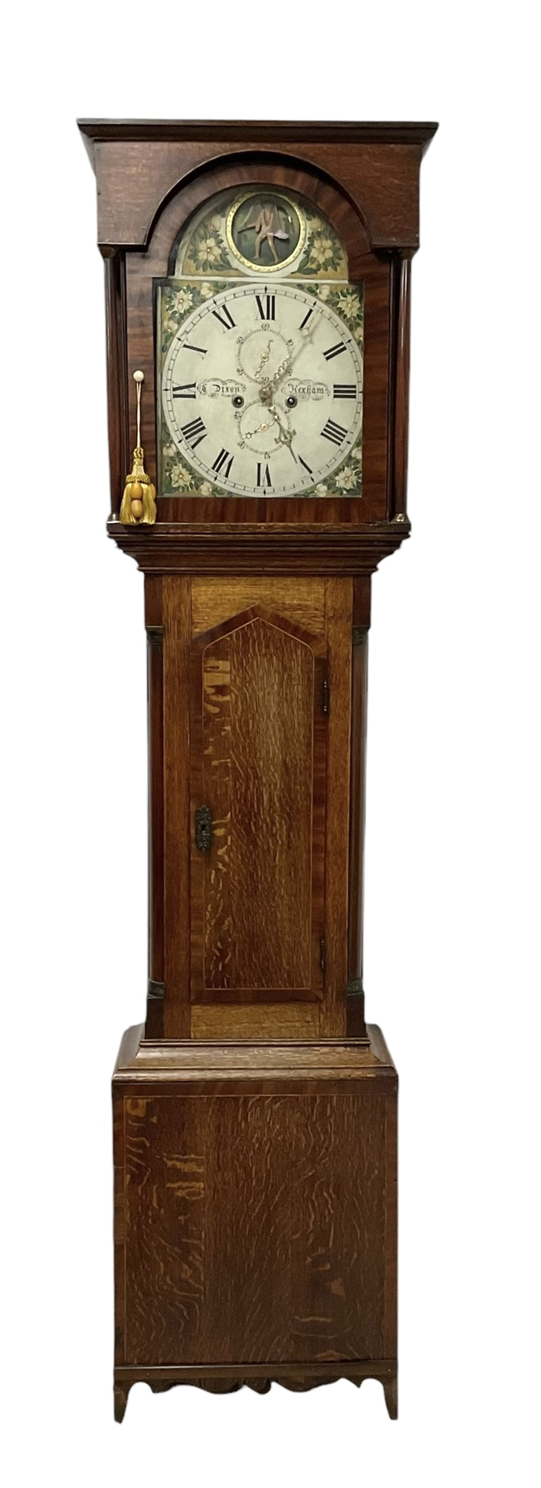 Dixon of Hexham - 19th century oak and mahogany 30-hour longcase clock, with a flat top and break arch hood door beneath, trunk with canted corners and a pointed top door, on a rectangular plinth with a shaped base, painted  dial with floral spandrels and a Father Time automaton to the arch, with Roman numerals, seconds and date dials and brass hands, dial pinned via a false plate to a chain driven countwheel striking movement, striking the hours on a bell. With pendulum and weight.