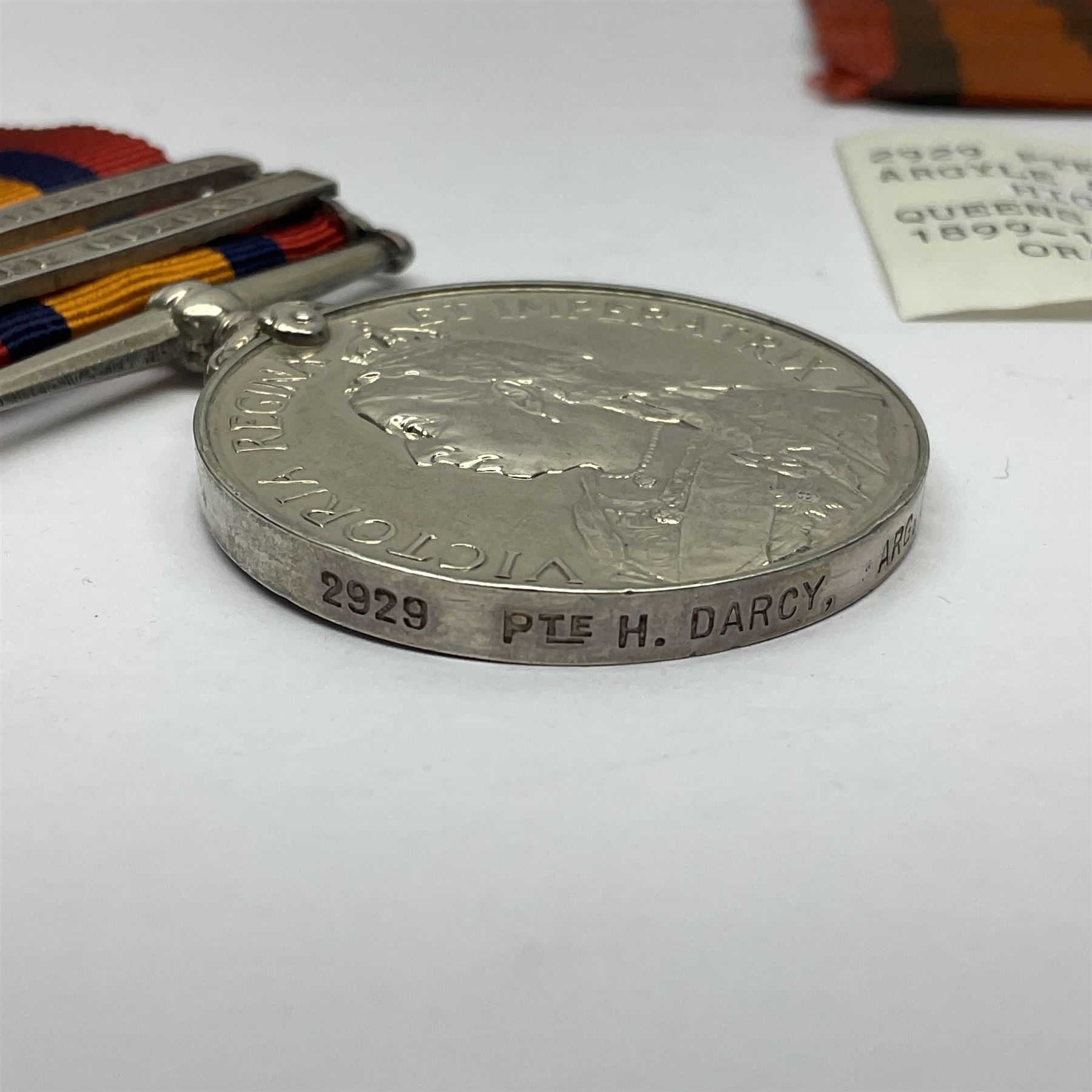 Victoria Queens South Africa Medal with Cape Colony and Orange Free State clasps awarded to 2929 Pte. H. Darcy Argyle and Sutherland Highlanders; with replacement ribbon and fragment of original.