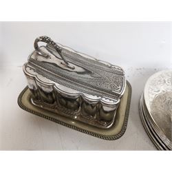 Glass hip flask, with silver cap/collar and plated cup and a silver topped pepper shaker, together with silver plated items including place mats, coasters, serving dishes, etc