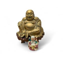 20th century Chinese Happy Buddha figure, together with a brass Buddha on wooden stand, br...