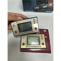 Three 1980s Nintendo Game & Watch handheld electronic games, to include a boxed Multi Screen Mario Bros example and two unboxed single screen examples Parachute and Fire, together with a Grandstand Astro Wars electronic game, boxed with instructions