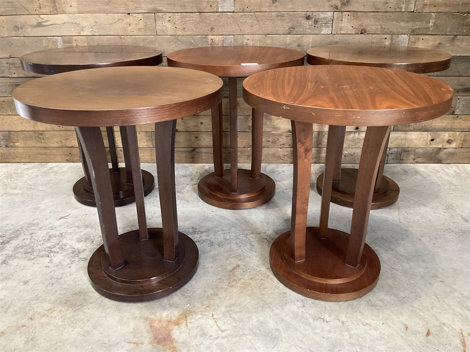 Five walnut circular bar or bedroom occasional tables