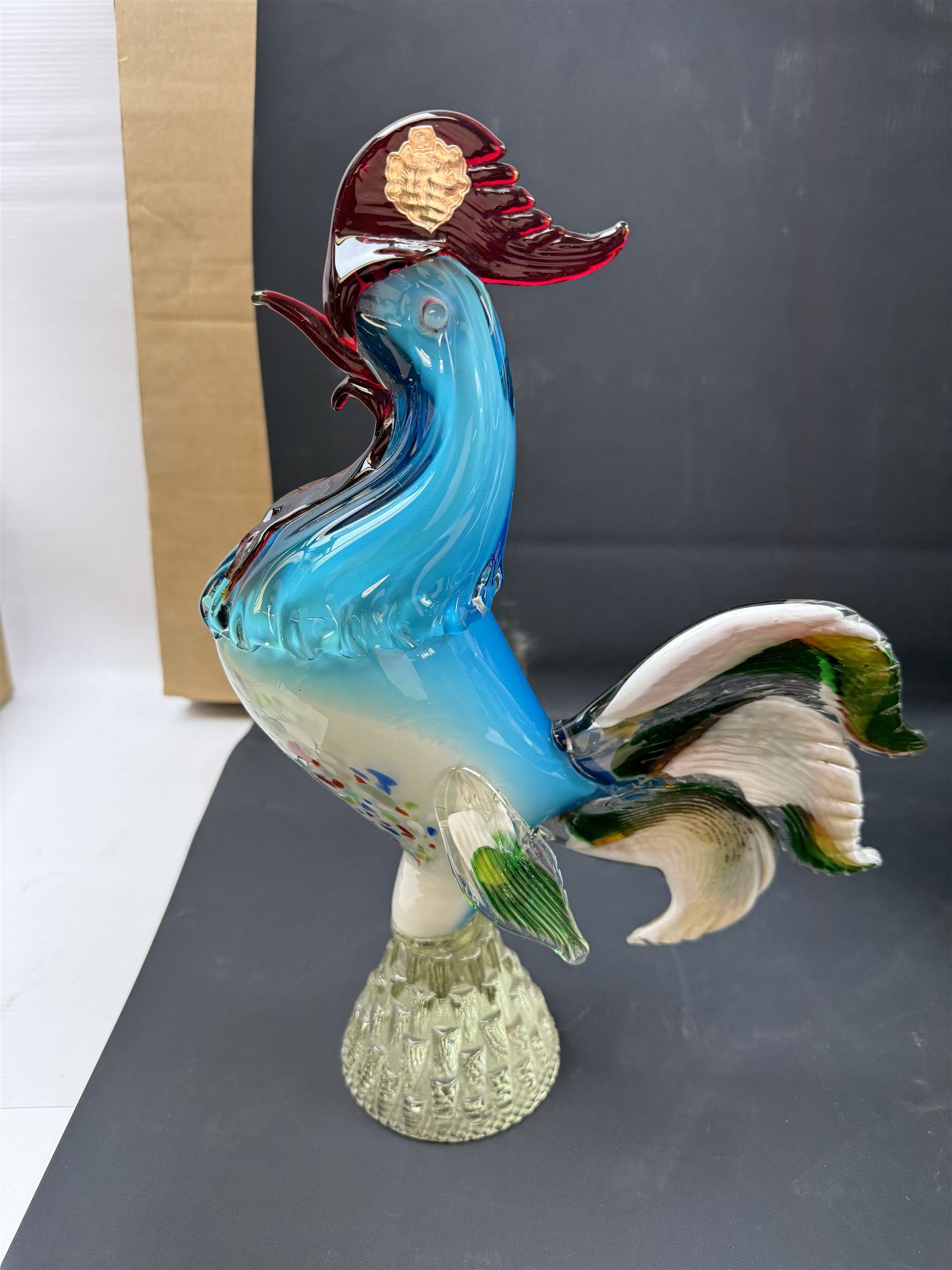 Two Murano glass clowns, together with similar glass figures, including cockerels and fish