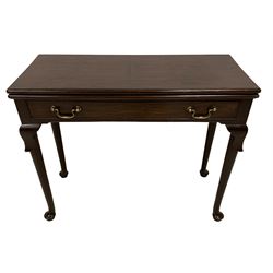 George III mahogany card table, moulded rectangular fold-over top revealing baize lined interior, single cocked-beaded frieze drawer with brass swan neck handles, on lappet carved cabriole supports, double gate-leg action base 