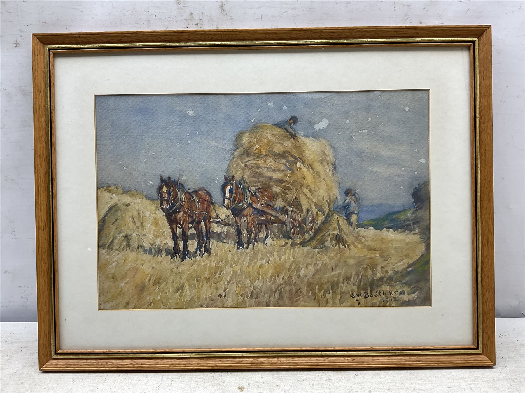 James William Booth (Staithes Group 1867-1953): Harvest Time, watercolour signed and dated 1913, 25.5cm x 40cm