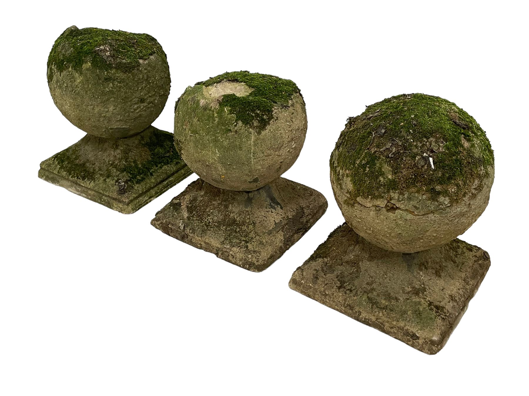 Set of three weathered cast stone gate post finials, circular orb on step-canted square base 