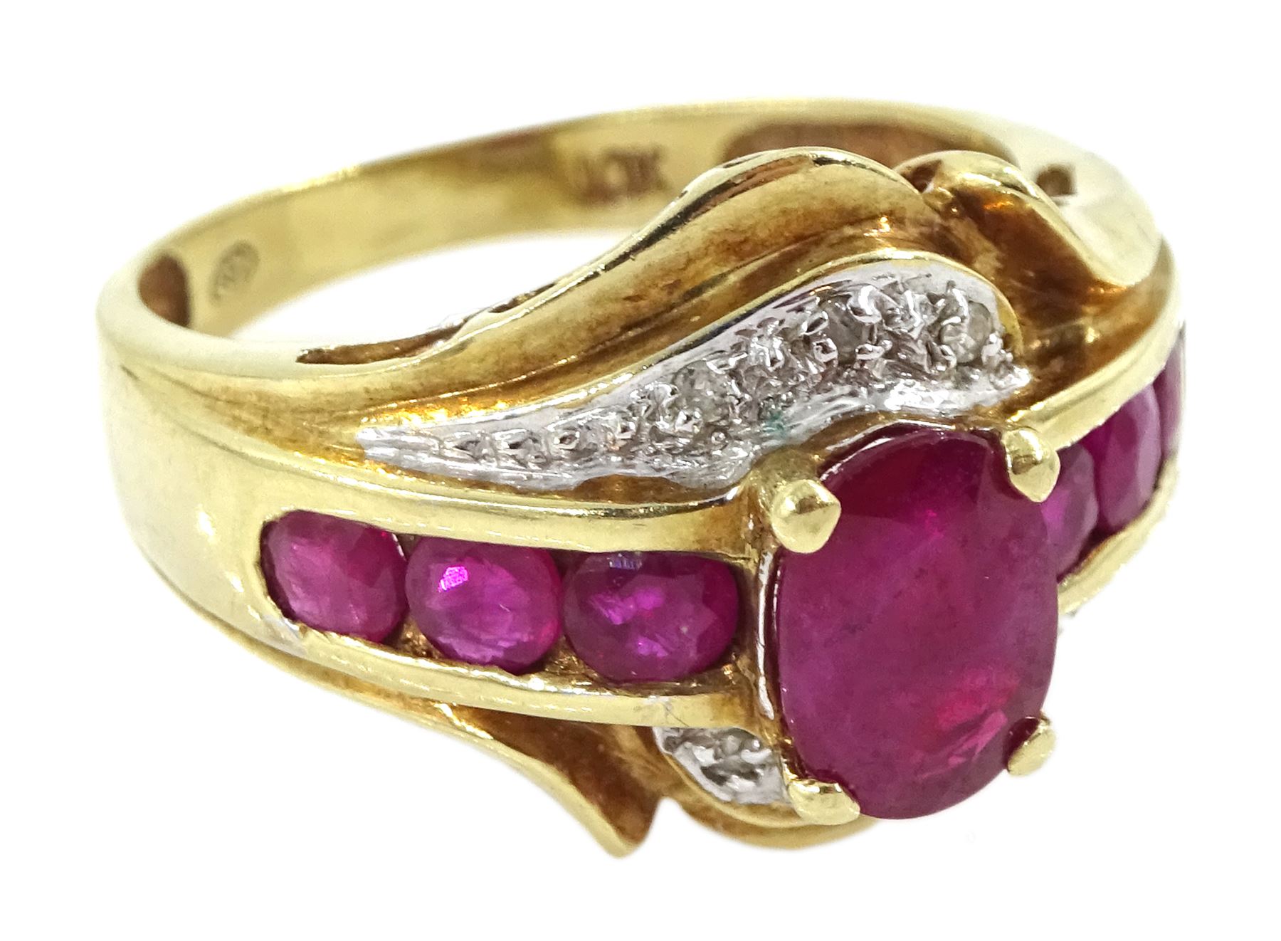 Gold ruby and diamond cluster ring, stamped 10K