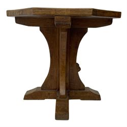 Mouseman - oak occasional table, octagonal adzed top, cruciform pedestal on sledge feet, carved with mouse signature, by the workshop of Robert Thompson, Kilburn 