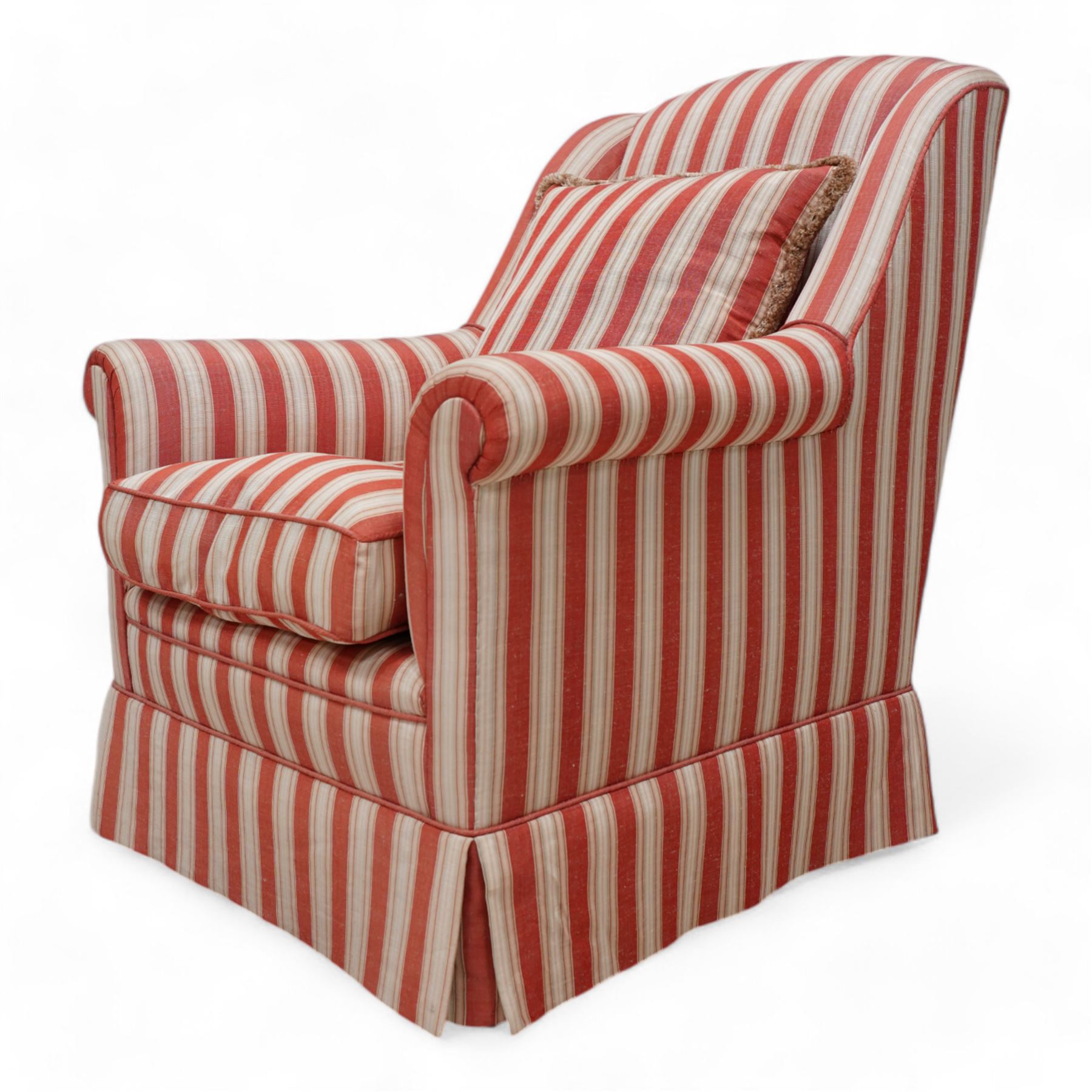 Edwardian hardwood-framed armchair, with rolled arms upholstered in red striped fabric, on square tapering front feet with brass and ceramic castors 