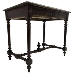 19th century walnut side table,  rectangular top with lunette carved moulded edge, the frieze drawer carved with ribbon and extending vine branch and grapes, on turned and fluted supports united by fluted stretcher with centre finial 