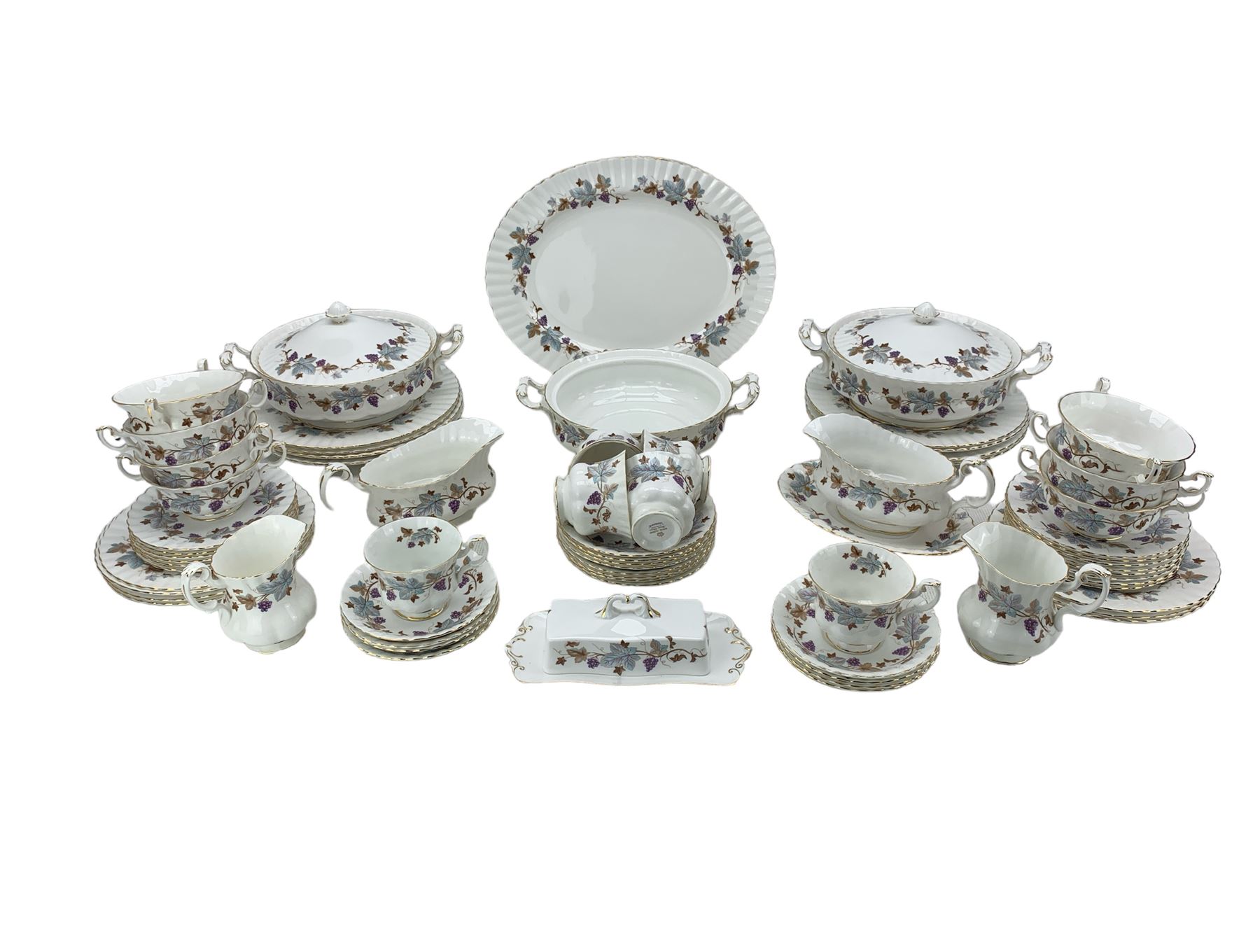 Royal Albert Lorraine pattern part tea and dinner service, comprising six tea cups and eight saucers, two milk jugs, eight dinner plates, fourteen sandwich plates, seven side plates, seven soup bowls and eight saucers, three tureens (one lacking cover), one large oval serving dish, two sauce boats (one with stand) and a butter dish