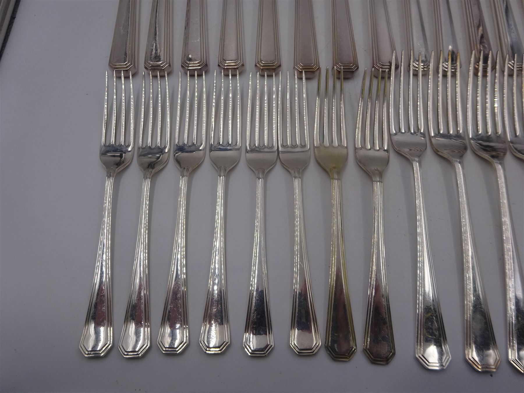 Mappin & Webb Athenian pattern silver cutlery for eight place settings, comprising table forks, silver handled table knives, dessert spoons, dessert forks, silver handled butter knives, soup spoons and teaspoons, hallmarked Mappin & Webb Ltd, Sheffield 1978, contained within anti-tarnish fabric wraps and boxed 