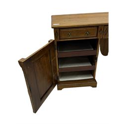 Late Victorian oak twin pedestal desk, chamfered rectangular top over three convex front edge drawers and two panelled cupboards, flanked by carved supports with roundels and diamond motif, on bracketed plinth base