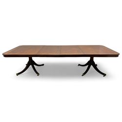 RBC Furniture (Made in England) - Georgian design mahogany dining table, rectangular top with rounded corners, satinwood and burr walnut bandings, two D-ends with two additional leaves and support rails, on barrel turned pedestals with four out-splayed reeded supports, brass cups and castors 