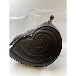 Victorian black matte metal coal scuttle, in the form of a nautilus shell, with ceramic wheels and handle, H47cm