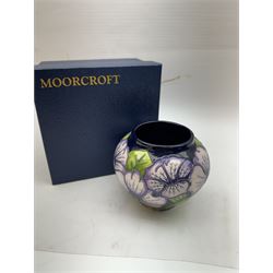 Moorcroft vase in Petunia pattern upon a ble ground, of squat baluster form, marked made for collectables to the base,  with original box, H12cm