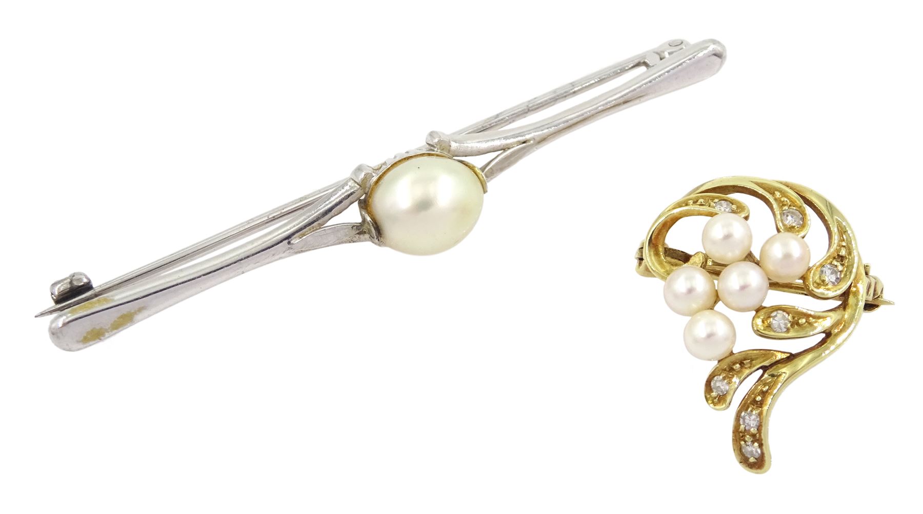 14ct gold round brilliant cut diamond and pearl brooch, stamped 585 and one other white gold single stone pearl brooch, stamped 9ct