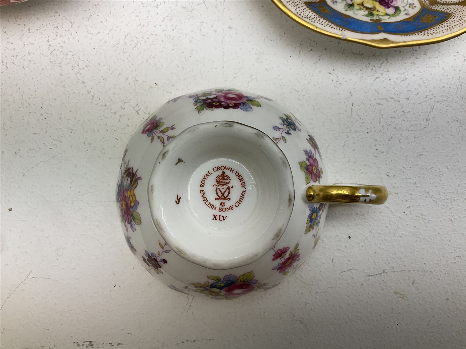 Royal Crown Derby tea wares, to include Royal Antoinette pattern coffee can and saucer, tea cup and saucer, side plate and dessert plate, Derby Days pattern tea cup and saucer, white glazed and fluted cup and saucer, example decorated with floral reserves and blue and gilt panels, side plate with blue and gilt edge, together with a Royal Crown Derby pheasant paperweight (lacking stopper), Dresden cup and saucer, and Dresden open salt, etc., in one box