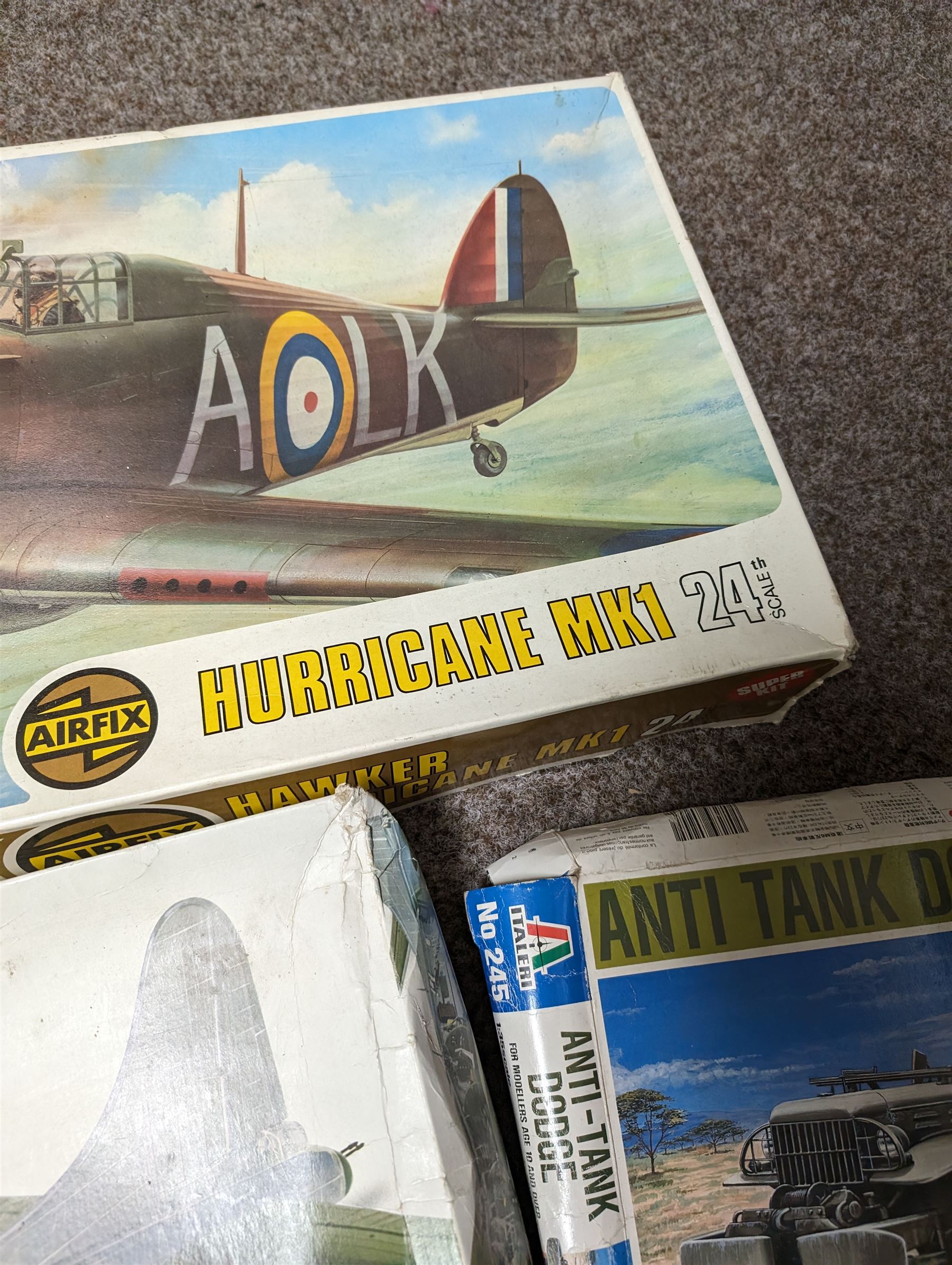 Three model kits, including Airfix Hawker Hurricane MK1 1:24 scale, Italeri Anti Tank Dodge 1:35 scale and Monogram Visible B-17 1:48 scale, all boxed 