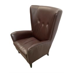 Wing back armchair upholstered in cocoa brown leather