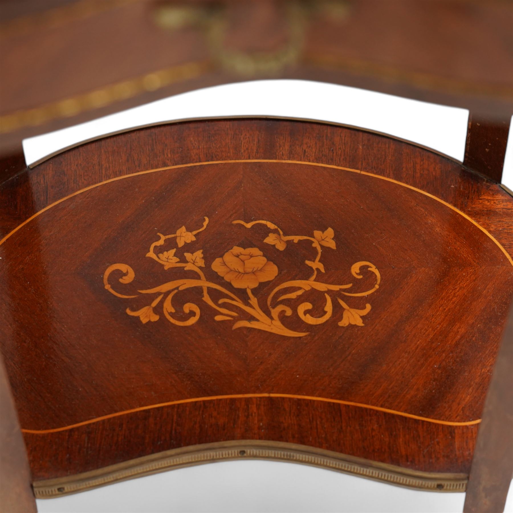 Early 20th century French walnut kidney-shaped occasional table, white marble top with raised pierced brass gallery, fitted with single frieze drawer, flanked by acanthus shaped gilt metal mounts, raised on cabriole supports united by a floral inlaid under-tier